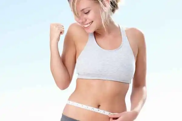 woman happy after fat reduction treatment Milton Keynes
