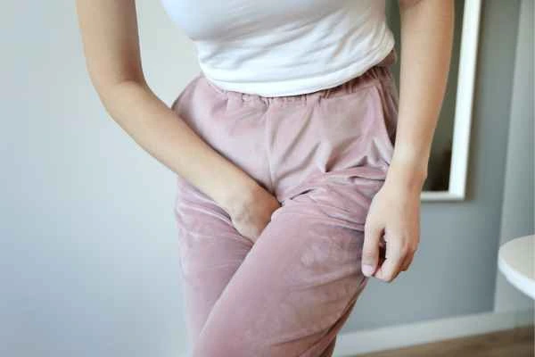 woman struggling with urine incontinence Milton Keynes